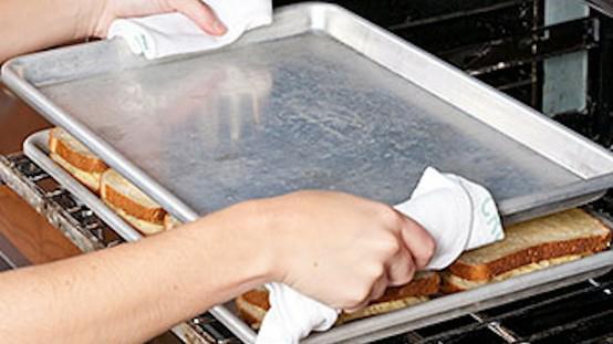 Bake Sandwiches between two baking sheets